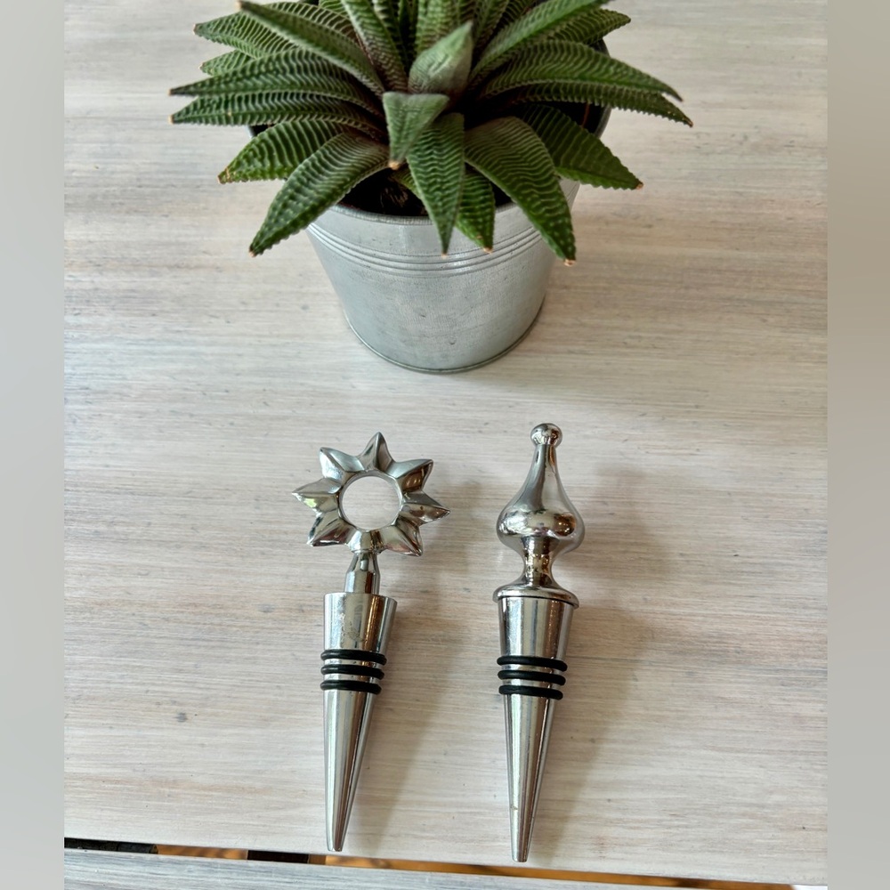 Two Silver Wine Stoppers (Star & Tear Drop Heads)